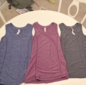 3 Lululemon Ruffled Back Tank Tops in Blue, Purple, and Gray